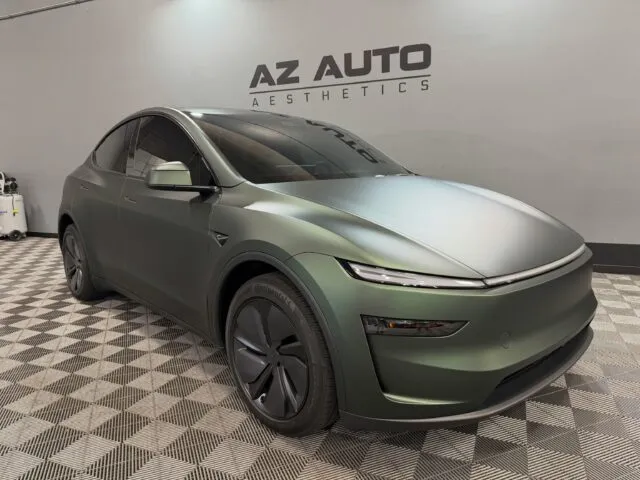🌲Full Body Protection with a Completely Different Presence.🌲 This 2026 Tesla Model Y underwent our Full-Body Coverage Option of @pureppf Satin Forest Green Paint Protection Film, transforming the look of the vehicle while protecting every painted surface from rock chips, road debris, and daily wear. To finish the exterior, we applied a Ceramic Top Coat, helping maintain the satin finish and making ongoing maintenance easier. Inside, our team completed our 7-Window + Windshield Tint using @xpel XR Prime Ceramic Window Tint, helping reduce heat, cut glare, and keep the cabin comfortable year-round. A complete transformation backed by real protection from top to bottom. Looking to change the look of your vehicle while keeping it protected for the long haul? 📞📲 Call or DM us today to book your Paint Protection Film, Ceramic Coating, or Window Tint! 📞📲 Az Auto Aesthetics 7613 E Ray Rd #114, Mesa, AZ 85212 Open: M–F 8:30–6 PM | Sat 9–2 PM / 📞 (480) 241-9324