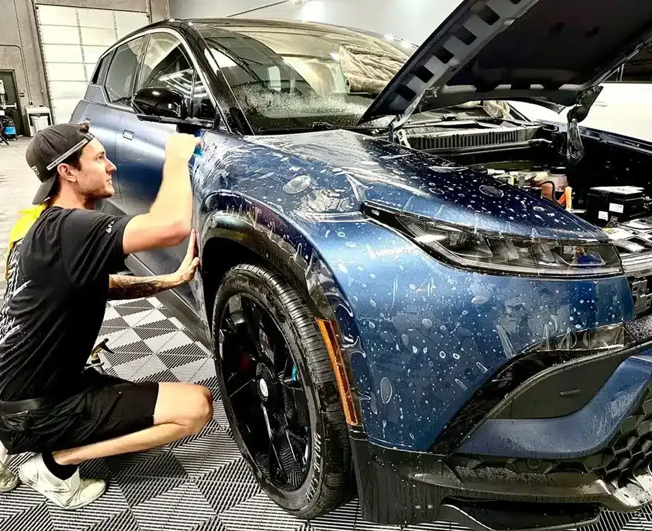 IMG_5537-1200×978 full body satin paint protection film being applied to an electric vehicle.