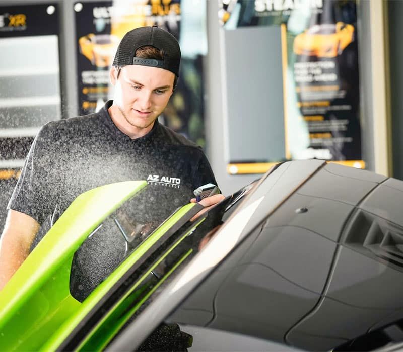 Car Undergoing Surface Prep Before Polishing