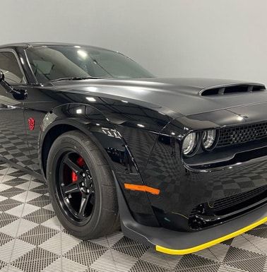 Automotive detailing shop black car front view