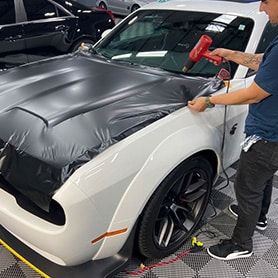 Black Matte Vinyl Wraps Installation On White Car Near Ahwatukee