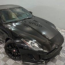 Black Jaguar Getting A Protection Package At Our Car Detailing Shop