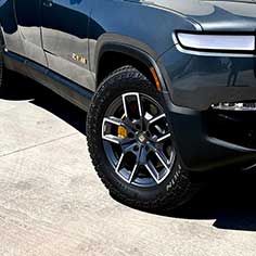Auto Detailers Specializing In Paint Correction And Vinyl Wraps On Rivian Car Models