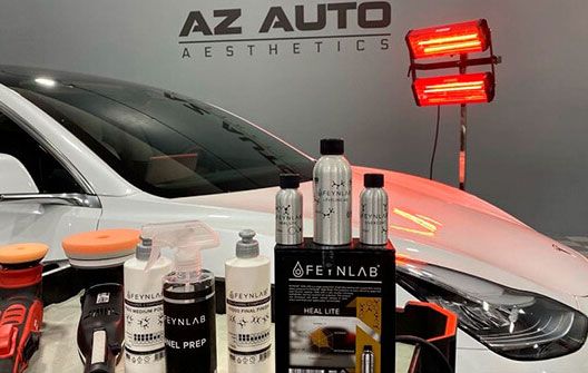 White Luxurious Car At Arizona Ceramic Coating with Products